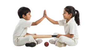 Boy and Girl Cricket Players Sitting and Giving High Five