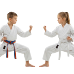 Boy and Girl Practicing Karate Martial Arts Stance