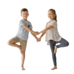 Boy and Girl Practicing Yoga Tree Pose Together