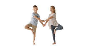 Boy and Girl Practicing Yoga Tree Pose Together