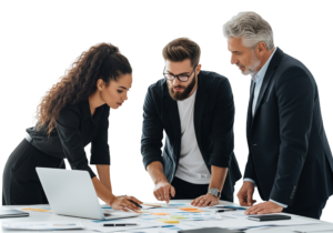 Corporate Business Team Collaborating Around Table with Documents and Laptop