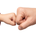 Father and Child Fist Bump Gesture