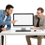 Two Men Collaborating on a Computer with Blank Screen