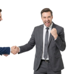 Two Professional Businessmen Shaking Hands and Celebrating Deal