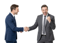 Two Professional Businessmen Shaking Hands and Celebrating Deal