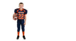 Young Boy American Football Player Holding Ball Uniform