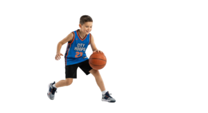 Young Boy Basketball Player Dribbling Ball Action