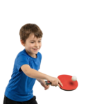 Young Boy Playing Table Tennis Hitting Ping Pong Ball