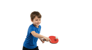 Young Boy Playing Table Tennis Hitting Ping Pong Ball