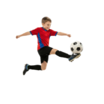 Young Boy Soccer Player Kicking Ball Flying in Air Action Shot