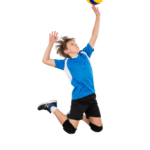 Young Boy Volleyball Player Jumping to Spike Ball