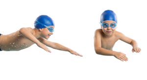 Young Boys Swimming in Pool Wearing Goggles and Cap