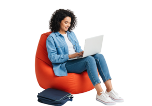 Young Woman Working on Laptop Computer Sitting in Comfortable Bean Bag